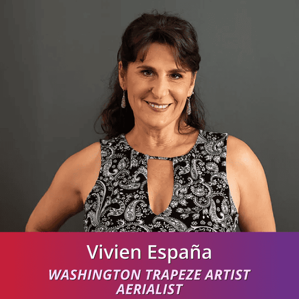 Vivien España: Washington Trapeze Artist Aerialist, an Italian woman with tan skin and dark brown hair pulled back wearing a black and white patterned shirt