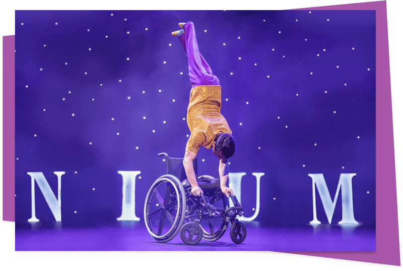 Rik Daniels, doing a handstand on his wheelchair